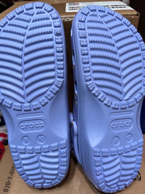 CROCS Shoes - Disney 100th Anniversary Edition Crocs featuring a purple color and iconic Micke
